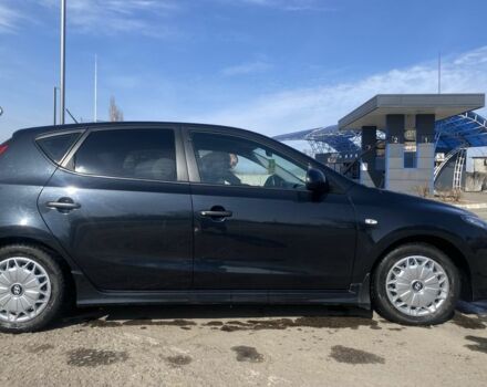 Черный Хендай i30, объемом двигателя 1.4 л и пробегом 210 тыс. км за 6400 $, фото 1 на Automoto.ua