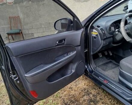 Черный Хендай i30, объемом двигателя 1.4 л и пробегом 215 тыс. км за 5000 $, фото 10 на Automoto.ua