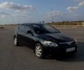 Черный Хендай i30, объемом двигателя 1.4 л и пробегом 160 тыс. км за 5000 $, фото 1 на Automoto.ua