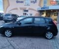 Чорний Хендай i30, об'ємом двигуна 1.4 л та пробігом 158 тис. км за 5750 $, фото 4 на Automoto.ua