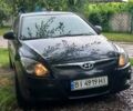 Черный Хендай i30, объемом двигателя 1.4 л и пробегом 275 тыс. км за 4700 $, фото 1 на Automoto.ua