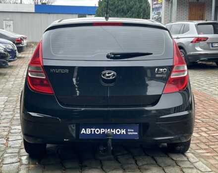 Черный Хендай i30, объемом двигателя 1.4 л и пробегом 240 тыс. км за 6000 $, фото 3 на Automoto.ua
