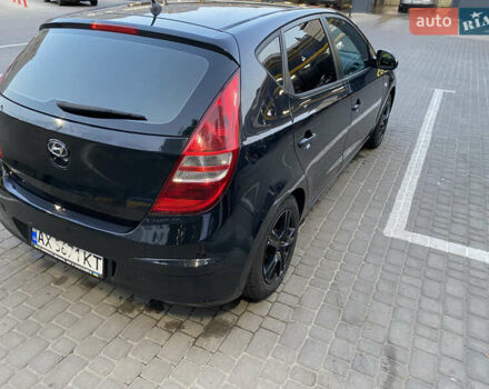 Черный Хендай i30, объемом двигателя 1.4 л и пробегом 194 тыс. км за 6000 $, фото 3 на Automoto.ua