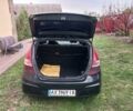 Черный Хендай i30, объемом двигателя 1.4 л и пробегом 139 тыс. км за 6200 $, фото 6 на Automoto.ua