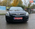 Чорний Хендай i30, об'ємом двигуна 1.4 л та пробігом 136 тис. км за 6100 $, фото 2 на Automoto.ua