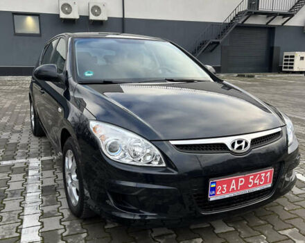 Черный Хендай i30, объемом двигателя 1.4 л и пробегом 140 тыс. км за 6300 $, фото 3 на Automoto.ua