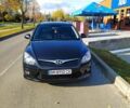 Черный Хендай i30, объемом двигателя 1.4 л и пробегом 148 тыс. км за 6400 $, фото 1 на Automoto.ua