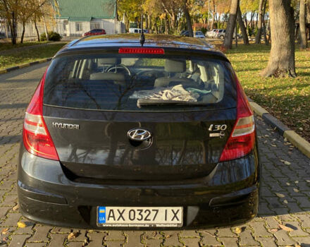 Черный Хендай i30, объемом двигателя 1.4 л и пробегом 242 тыс. км за 6000 $, фото 13 на Automoto.ua