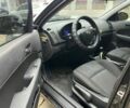 Черный Хендай i30, объемом двигателя 1.4 л и пробегом 240 тыс. км за 6000 $, фото 7 на Automoto.ua