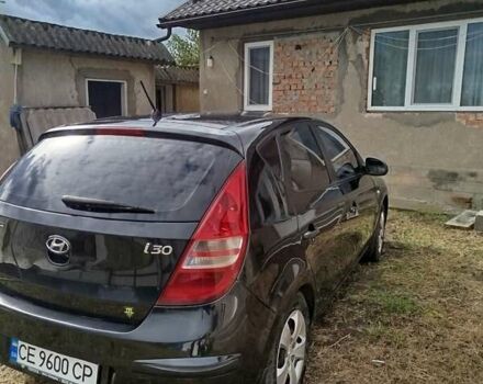 Черный Хендай i30, объемом двигателя 1.4 л и пробегом 215 тыс. км за 5500 $, фото 5 на Automoto.ua