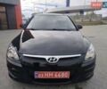 Черный Хендай i30, объемом двигателя 1.4 л и пробегом 160 тыс. км за 5999 $, фото 2 на Automoto.ua