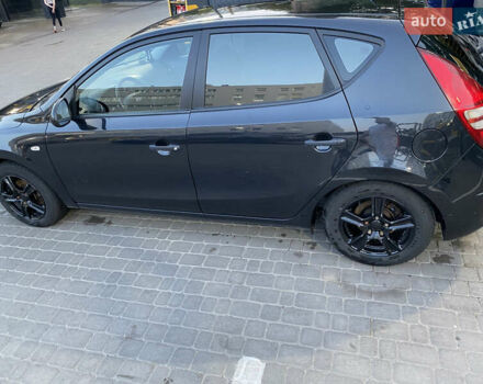 Черный Хендай i30, объемом двигателя 1.4 л и пробегом 194 тыс. км за 6000 $, фото 6 на Automoto.ua