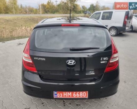Черный Хендай i30, объемом двигателя 1.4 л и пробегом 160 тыс. км за 5999 $, фото 6 на Automoto.ua