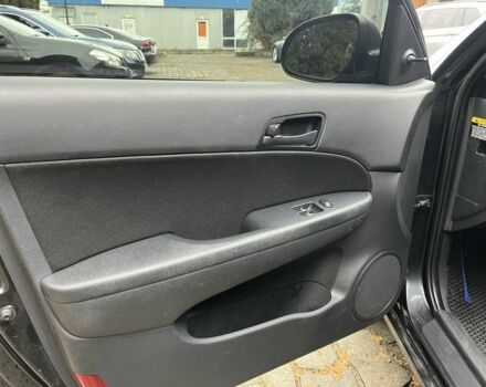 Черный Хендай i30, объемом двигателя 1.4 л и пробегом 240 тыс. км за 6000 $, фото 8 на Automoto.ua