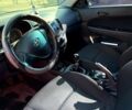 Черный Хендай i30, объемом двигателя 1.4 л и пробегом 232 тыс. км за 5200 $, фото 1 на Automoto.ua
