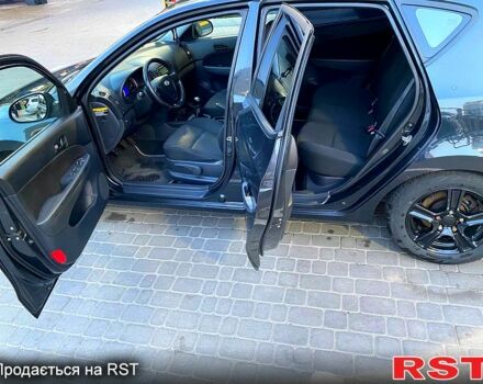 Чорний Хендай i30, об'ємом двигуна 1.4 л та пробігом 194 тис. км за 6000 $, фото 4 на Automoto.ua
