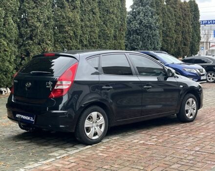 Черный Хендай i30, объемом двигателя 1.4 л и пробегом 240 тыс. км за 6000 $, фото 2 на Automoto.ua