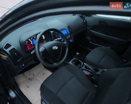 Чорний Хендай i30, об'ємом двигуна 1.4 л та пробігом 158 тис. км за 5750 $, фото 1 на Automoto.ua
