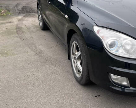 Черный Хендай i30, объемом двигателя 1.6 л и пробегом 255 тыс. км за 6800 $, фото 1 на Automoto.ua