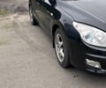 Черный Хендай i30, объемом двигателя 1.6 л и пробегом 255 тыс. км за 6800 $, фото 1 на Automoto.ua