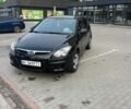 Черный Хендай i30, объемом двигателя 1.4 л и пробегом 200 тыс. км за 5700 $, фото 1 на Automoto.ua