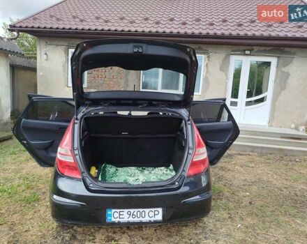 Черный Хендай i30, объемом двигателя 1.4 л и пробегом 215 тыс. км за 5000 $, фото 26 на Automoto.ua