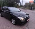 Чорний Хендай i30, об'ємом двигуна 1.4 л та пробігом 158 тис. км за 5750 $, фото 3 на Automoto.ua
