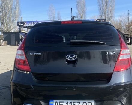 Черный Хендай i30, объемом двигателя 1.4 л и пробегом 210 тыс. км за 6400 $, фото 2 на Automoto.ua