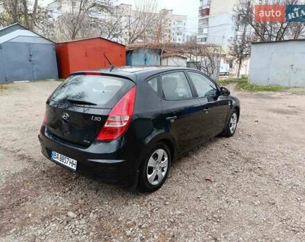 Черный Хендай i30, объемом двигателя 1.4 л и пробегом 314 тыс. км за 5650 $, фото 11 на Automoto.ua