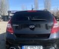 Черный Хендай i30, объемом двигателя 1.4 л и пробегом 210 тыс. км за 6400 $, фото 2 на Automoto.ua