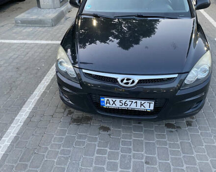Черный Хендай i30, объемом двигателя 1.4 л и пробегом 194 тыс. км за 6000 $, фото 1 на Automoto.ua