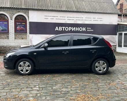 Черный Хендай i30, объемом двигателя 1.4 л и пробегом 240 тыс. км за 6000 $, фото 4 на Automoto.ua