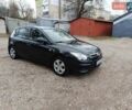 Черный Хендай i30, объемом двигателя 1.4 л и пробегом 314 тыс. км за 5650 $, фото 1 на Automoto.ua