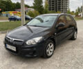 Черный Хендай i30, объемом двигателя 1.4 л и пробегом 148 тыс. км за 5900 $, фото 1 на Automoto.ua