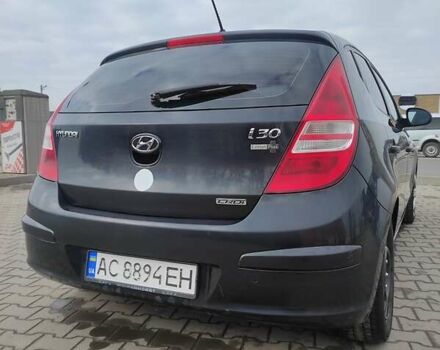 Чорний Хендай i30, об'ємом двигуна 1.6 л та пробігом 274 тис. км за 5700 $, фото 4 на Automoto.ua