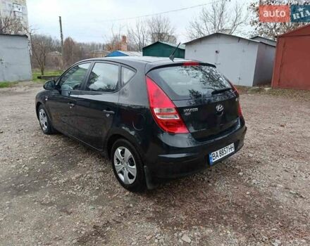 Черный Хендай i30, объемом двигателя 1.4 л и пробегом 314 тыс. км за 5650 $, фото 7 на Automoto.ua