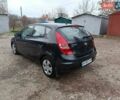 Черный Хендай i30, объемом двигателя 1.4 л и пробегом 314 тыс. км за 5650 $, фото 7 на Automoto.ua