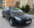 Черный Хендай i30, объемом двигателя 1.4 л и пробегом 148 тыс. км за 5900 $, фото 1 на Automoto.ua