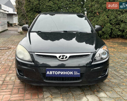 Черный Хендай i30, объемом двигателя 1.4 л и пробегом 240 тыс. км за 6000 $, фото 9 на Automoto.ua