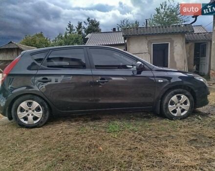 Черный Хендай i30, объемом двигателя 1.4 л и пробегом 215 тыс. км за 5000 $, фото 6 на Automoto.ua