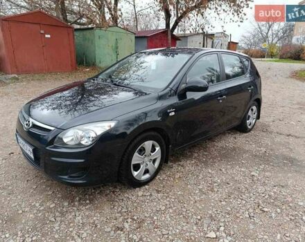 Черный Хендай i30, объемом двигателя 1.4 л и пробегом 314 тыс. км за 5650 $, фото 5 на Automoto.ua