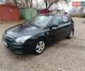 Черный Хендай i30, объемом двигателя 1.4 л и пробегом 314 тыс. км за 5650 $, фото 5 на Automoto.ua