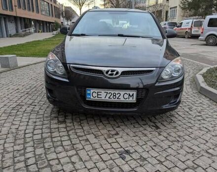 Черный Хендай i30, объемом двигателя 1.4 л и пробегом 174 тыс. км за 4800 $, фото 7 на Automoto.ua