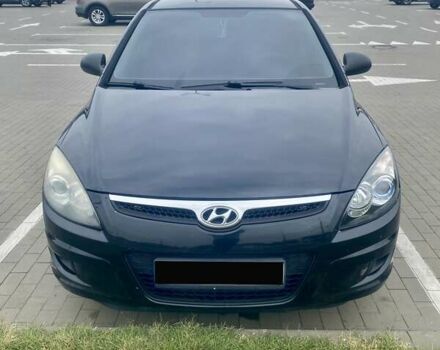Черный Хендай i30, объемом двигателя 1.4 л и пробегом 240 тыс. км за 6500 $, фото 4 на Automoto.ua
