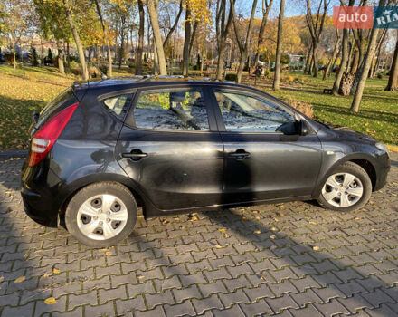 Черный Хендай i30, объемом двигателя 1.4 л и пробегом 242 тыс. км за 6000 $, фото 7 на Automoto.ua