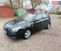 Черный Хендай i30, объемом двигателя 1.4 л и пробегом 314 тыс. км за 5650 $, фото 1 на Automoto.ua