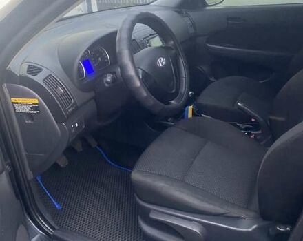 Черный Хендай i30, объемом двигателя 1.4 л и пробегом 240 тыс. км за 6500 $, фото 5 на Automoto.ua