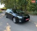 Черный Хендай i30, объемом двигателя 1.4 л и пробегом 193 тыс. км за 6600 $, фото 1 на Automoto.ua