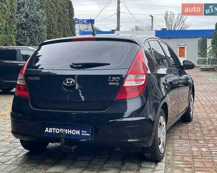 Черный Хендай i30, объемом двигателя 1.4 л и пробегом 240 тыс. км за 6000 $, фото 4 на Automoto.ua