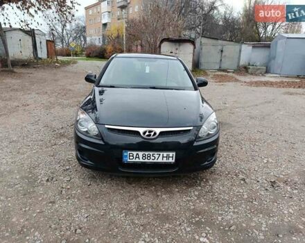 Черный Хендай i30, объемом двигателя 1.4 л и пробегом 314 тыс. км за 5650 $, фото 2 на Automoto.ua